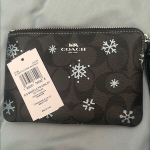 Coach Black and White Snowflake Wristlet